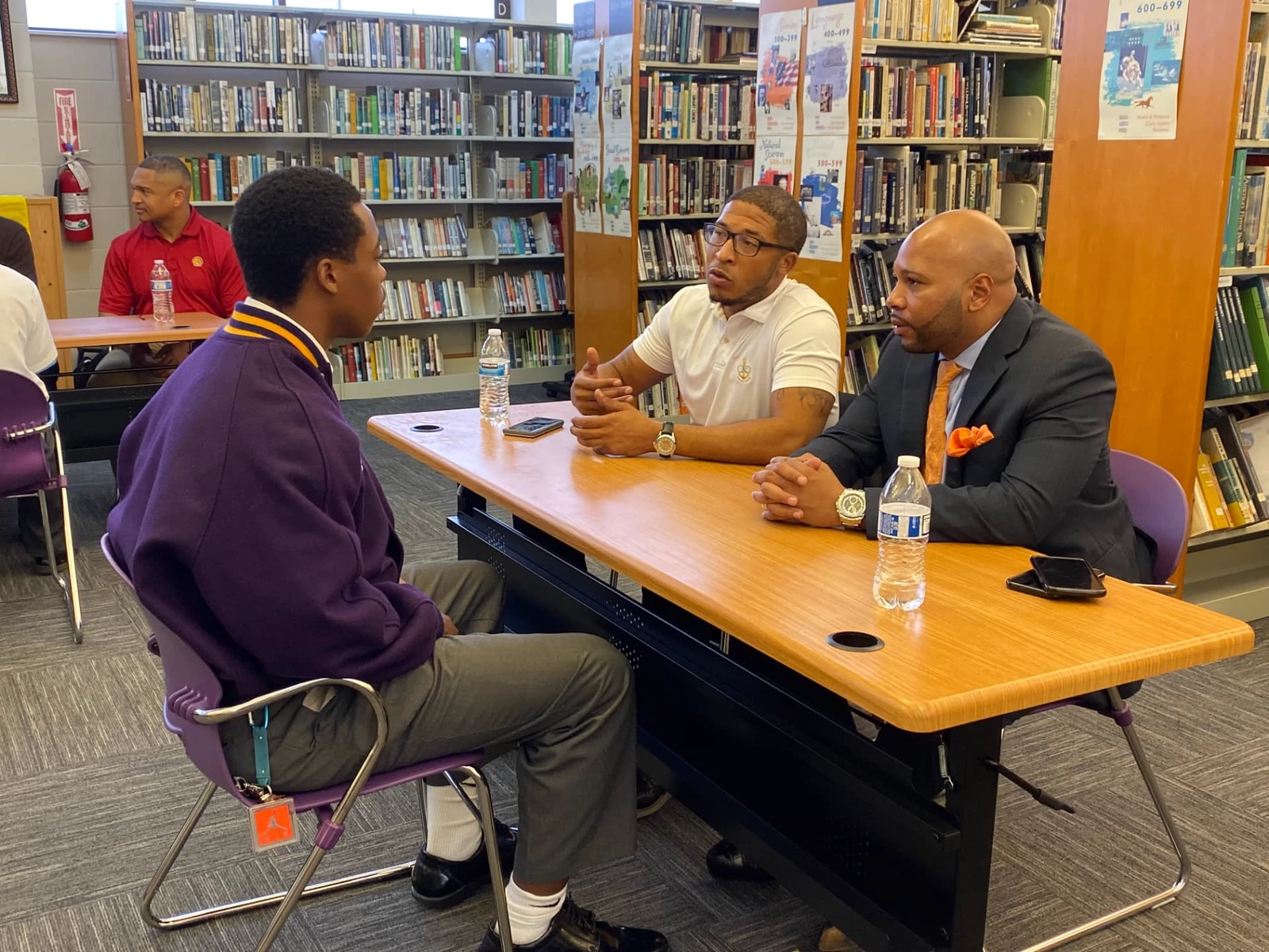 One-on-one coaching session with corporate leaders